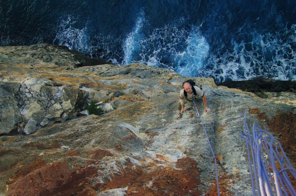 Tropical Rock Climbing over the Caribbean sea. Sea cliff climbing. Tropical rock climbing destination